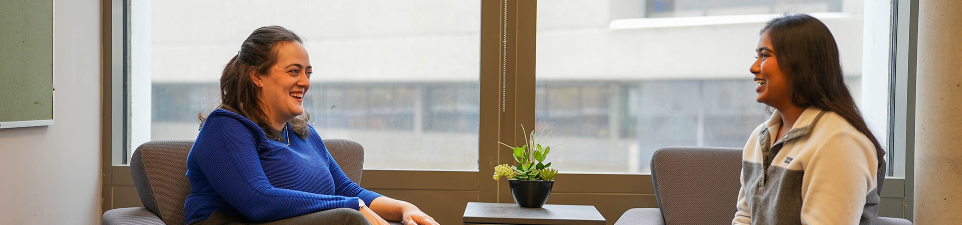 An advisor and a student meet for an appointment