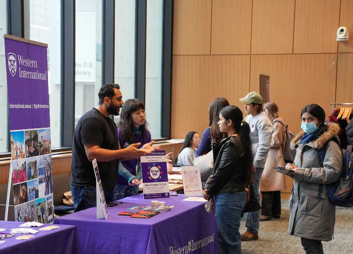 Several students attending a career fair.