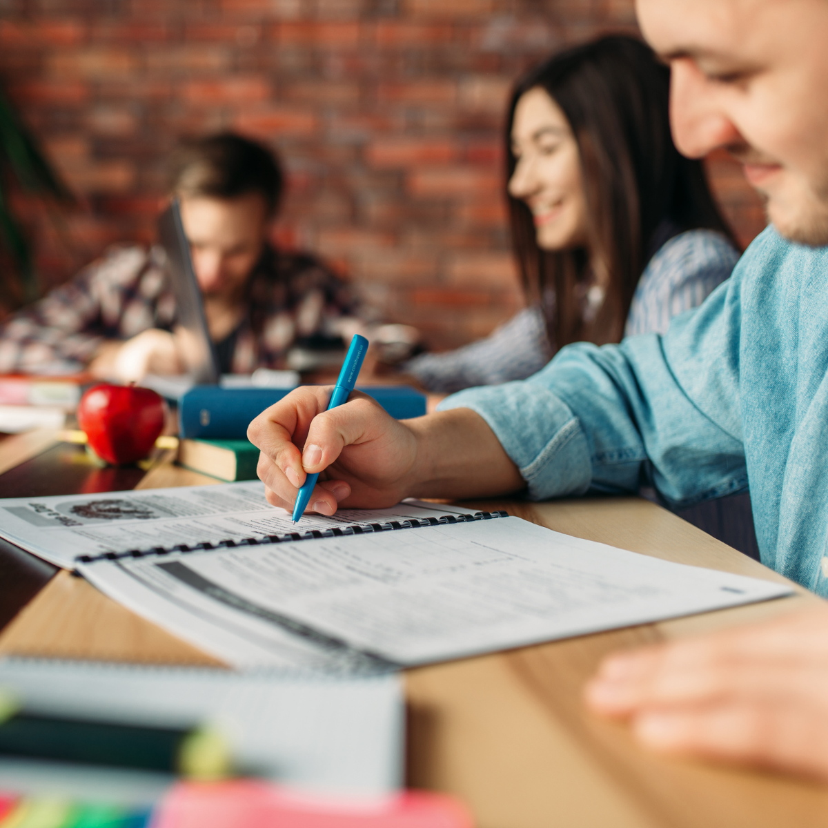 Grad students studying together at a table