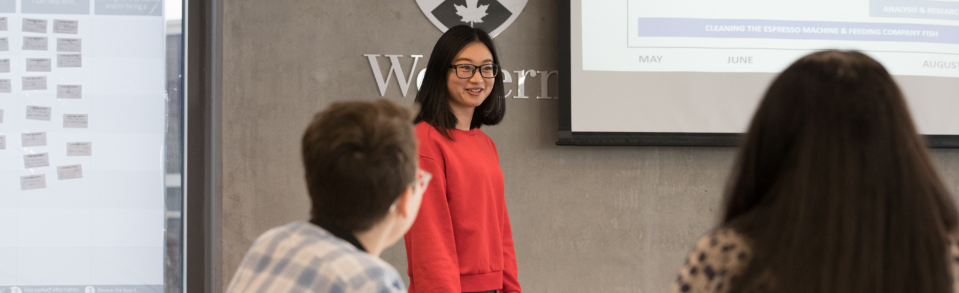 Grad student presenting to peers